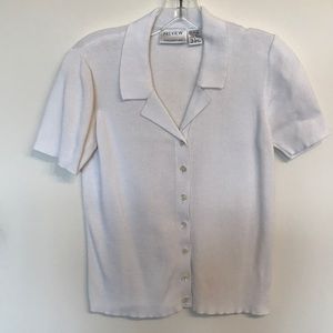 Cotton top with flair. Size Small. Good condition.